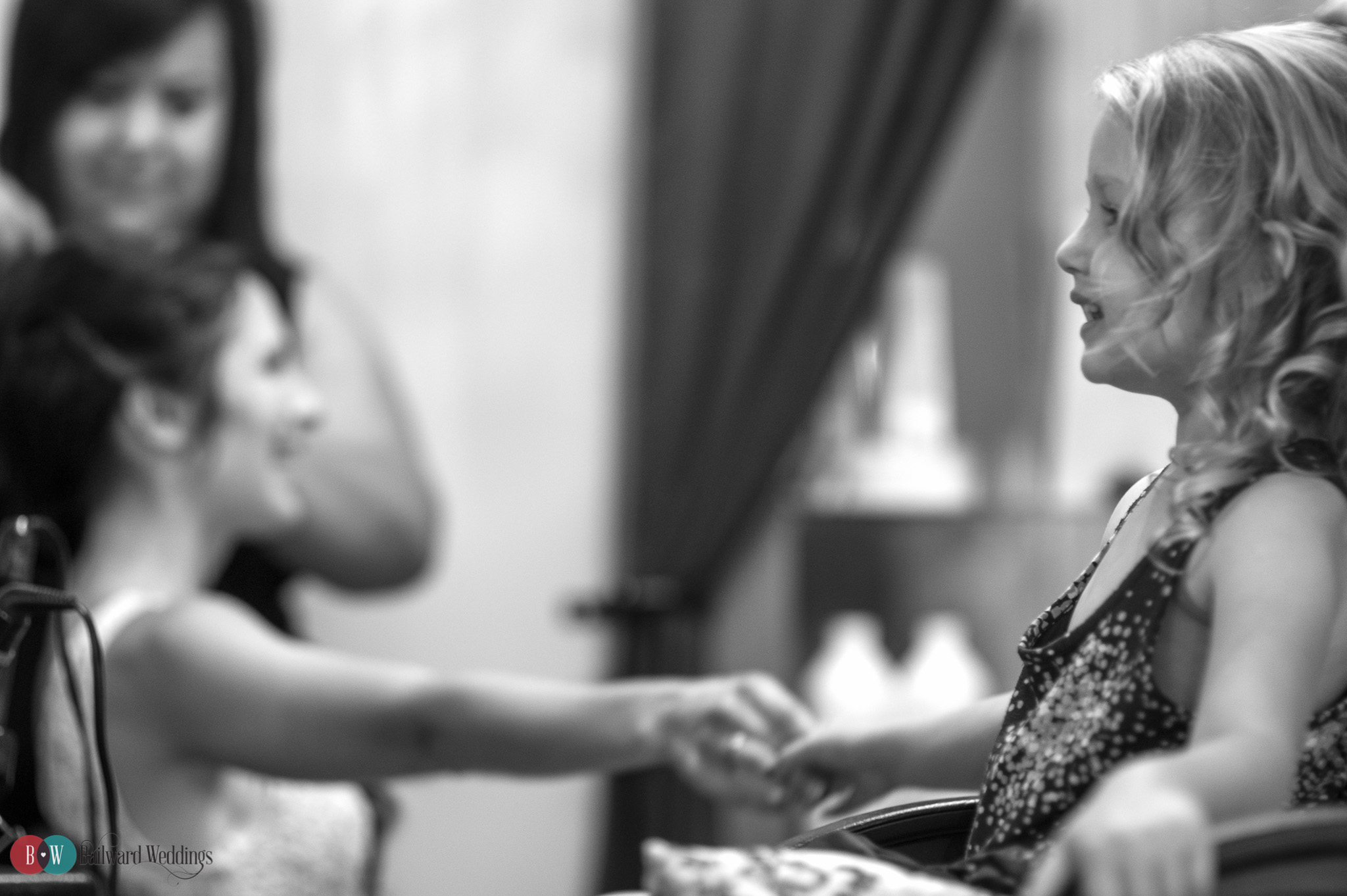 Bride holding flower girl's hand in Harrison Hot Springs wedding