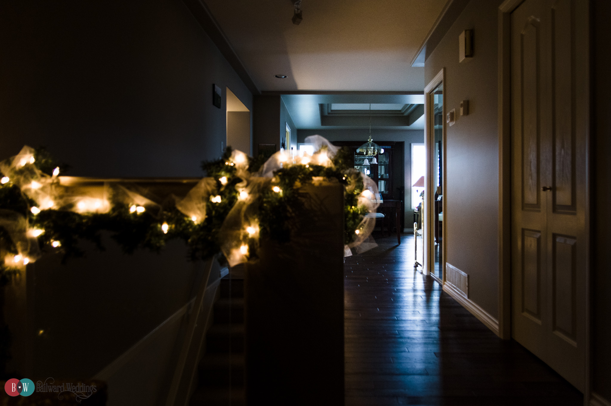 Home wedding with lights in hallway