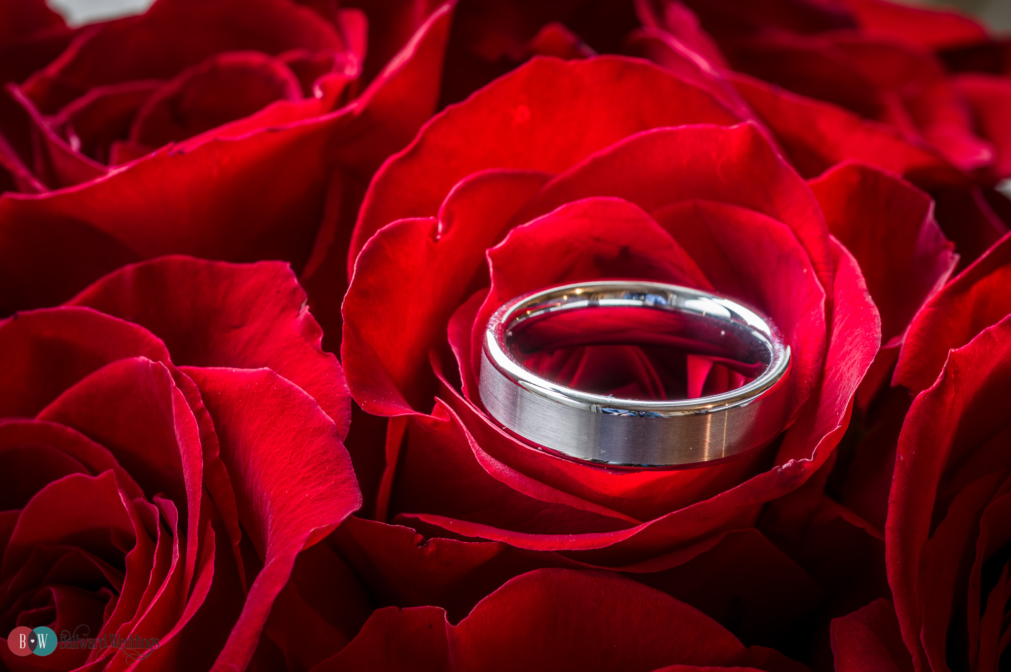 Wedding ring on rose bouquet 