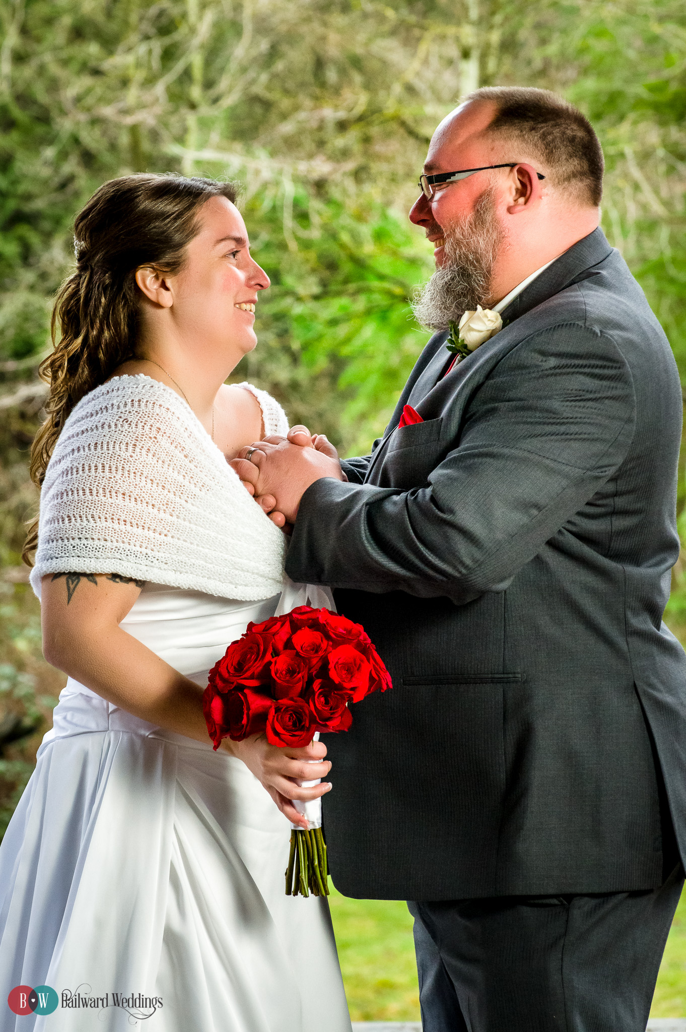 Bride and groom holding hands